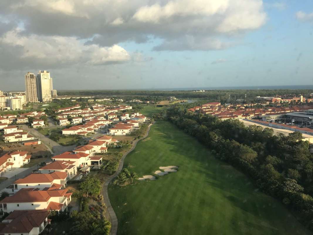 Spacious bright living room with marble flooring and terrace overlooking Santa Maria golf