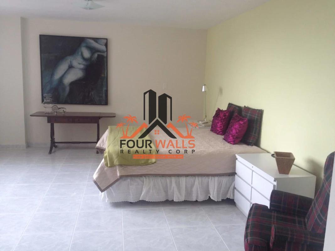 Large kitchen with granite countertops and ample cabinetry PH Rocomar Panama City