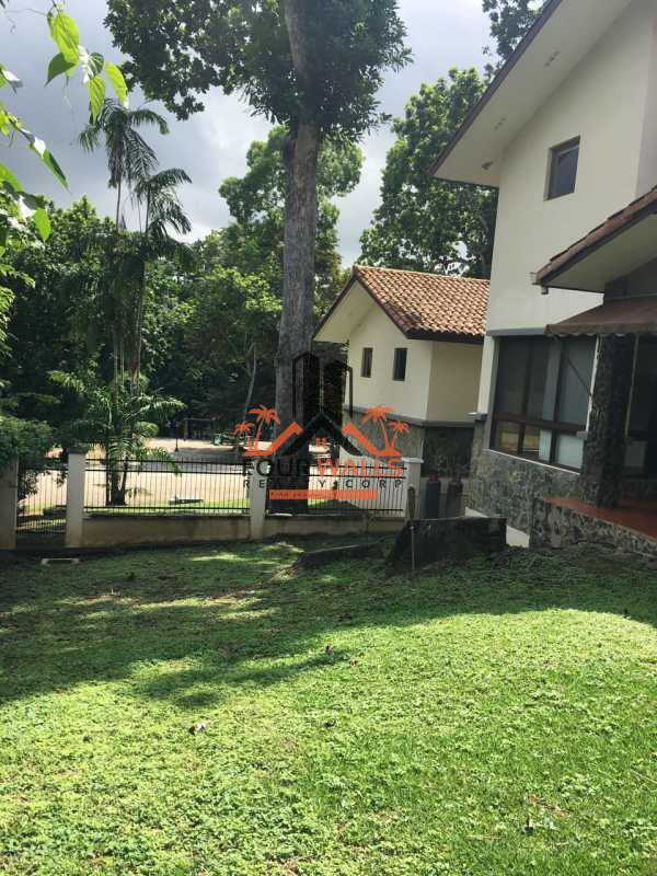 Two-story tropical style home lush green garden in PH Camino de Cruces Clayton Panama