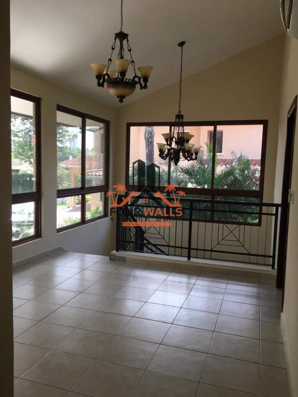 Interior sunroom with large windows bright tiled space PH Camino de Cruces Clayton Panama