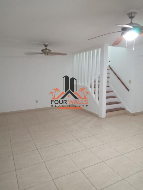 Bright bedroom with balcony access in family home Clayton Panama