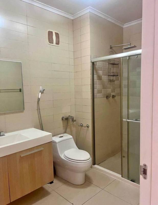 Master bedroom with floor-to-ceiling ocean views in PH White Tower Panama City