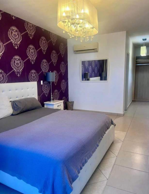 Contemporary bathroom with glass shower and modern fixtures PH White Avenida Balboa Panama City