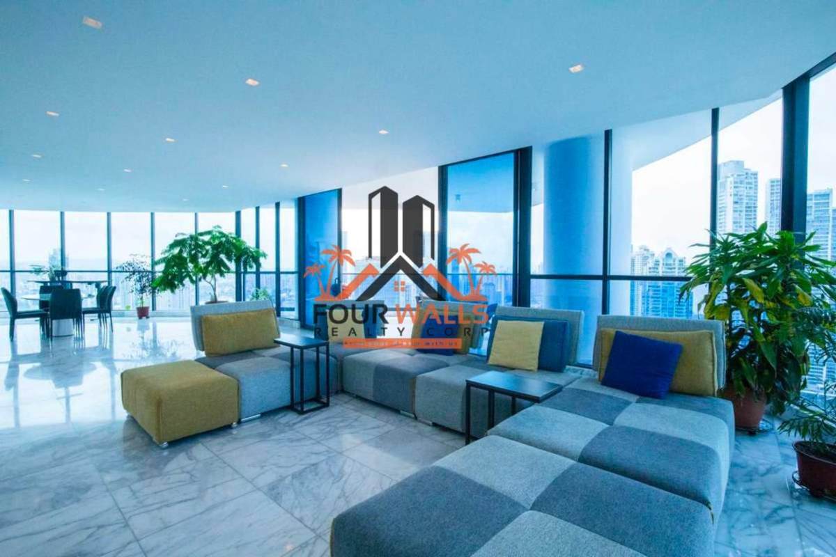 Spacious bedroom with city skyline view, large windows, and minimalist décor in PH Ocean Front Punta Paitilla Panama