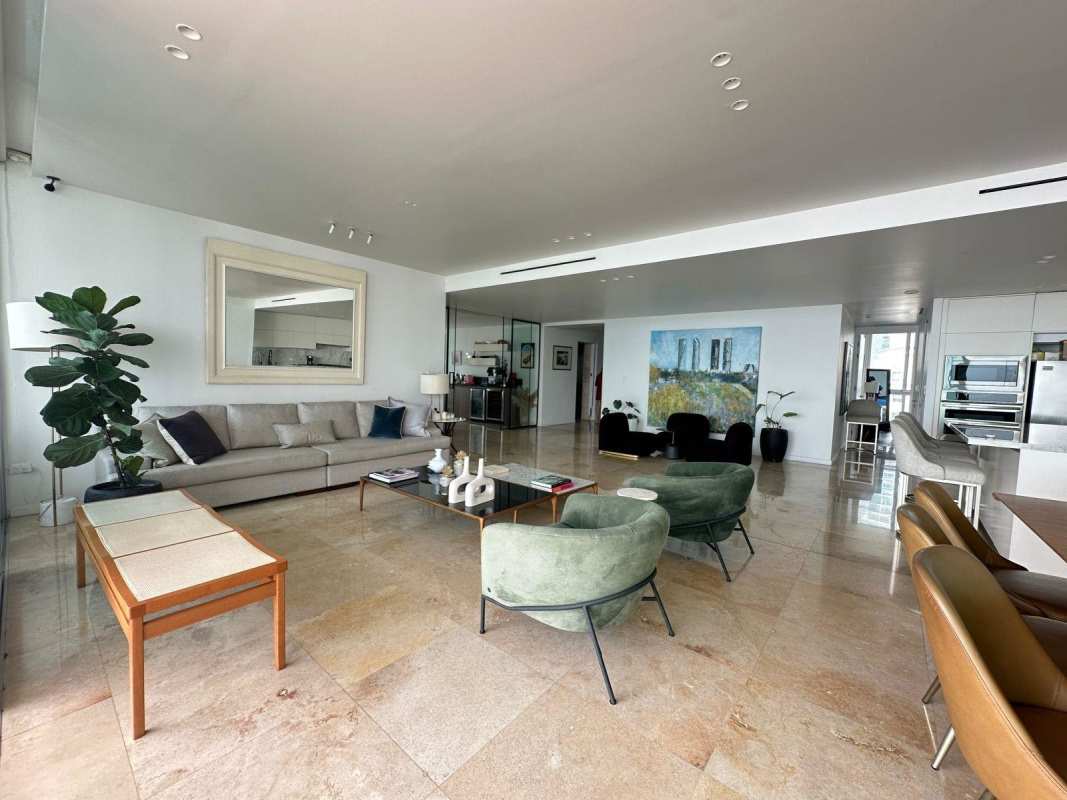 Modern kitchen with marble island, stainless refrigerator and built-in ovens in PH Venetian Tower Coco del Mar Panama