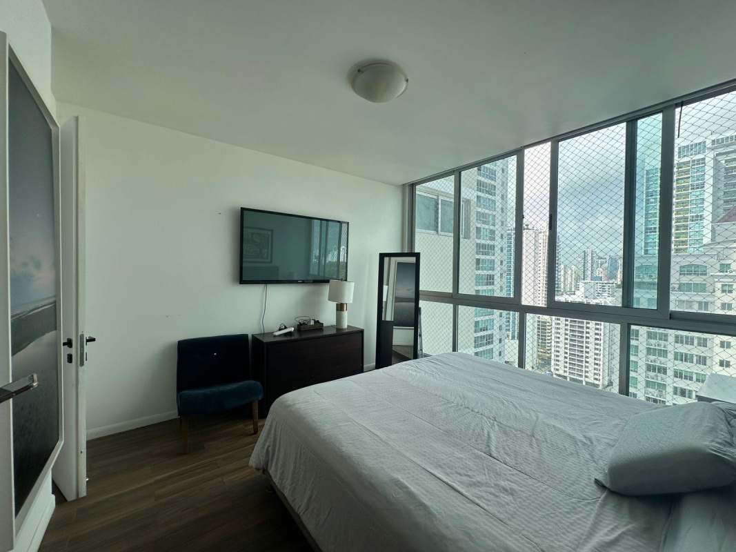 Dining room with marble floors, modern lighting, balcony access PH Venetian Tower Coco del Mar Panama