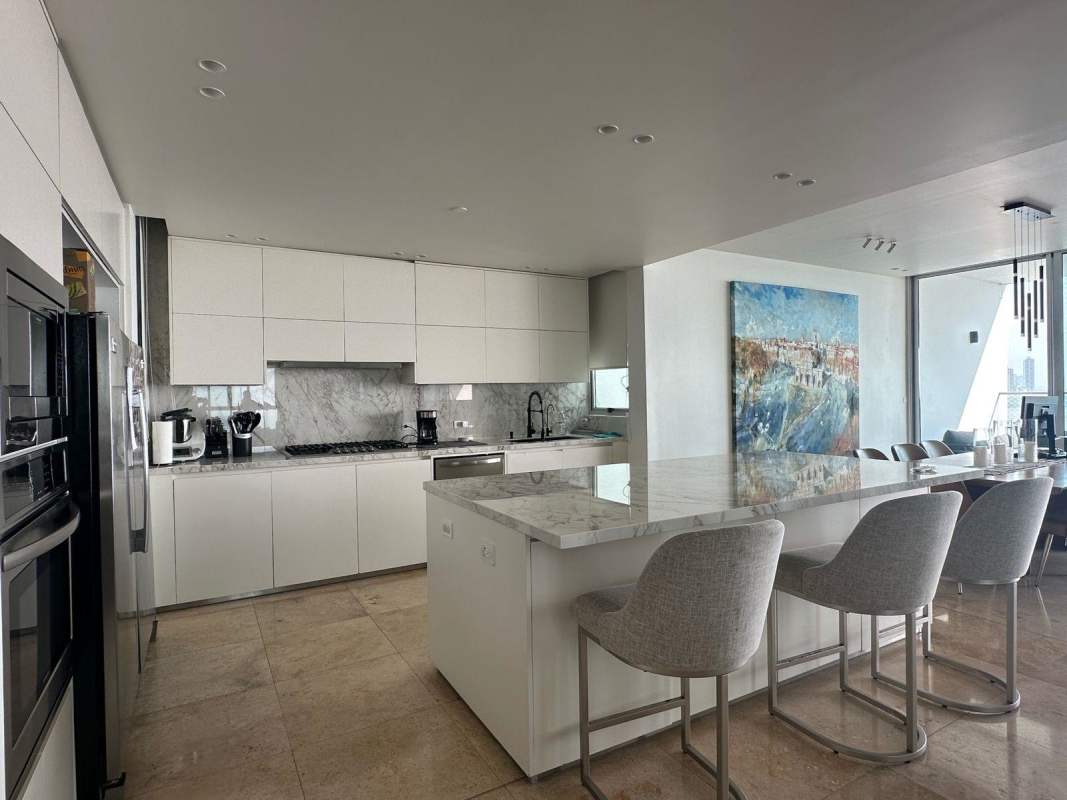 Kitchen with marble countertops and high-end appliances PH Venetian Tower Coco del Mar Panama