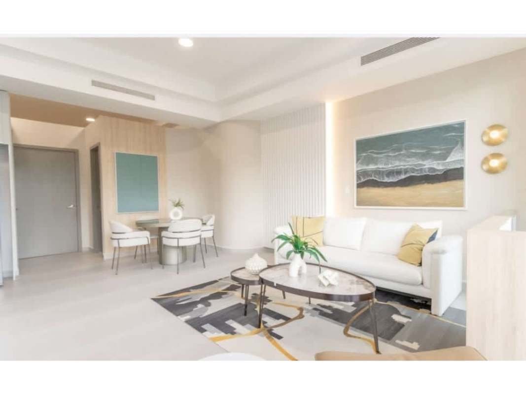 Lobby area with floor-to-ceiling glass, luxury finishes, and reception at PH Seaside House Panama City