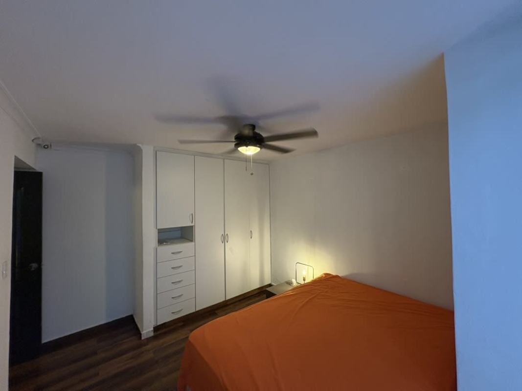Second bedroom with closet, ceiling fan and tiled flooring in PH San Francisco Panama