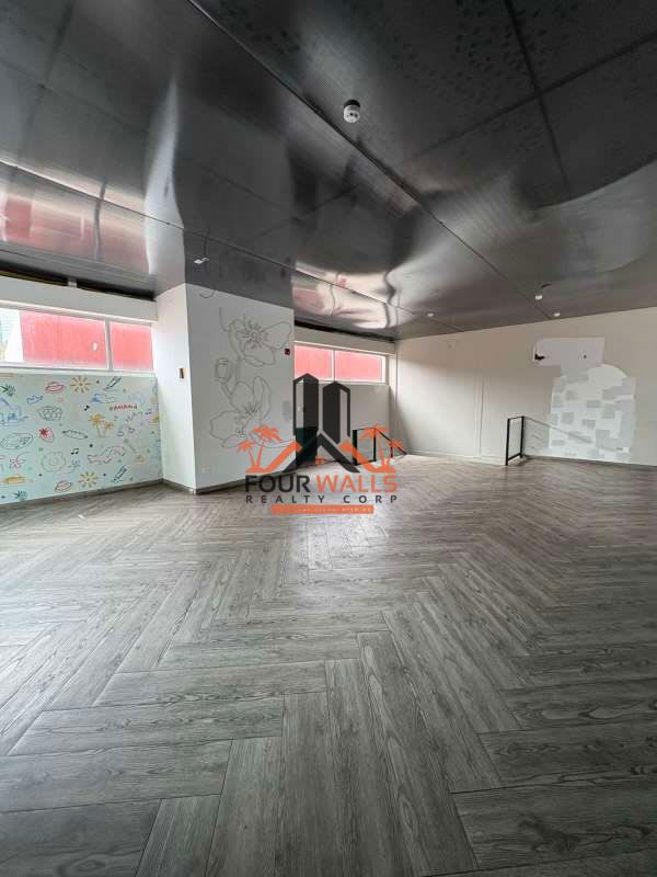 Mixed-use commercial and residential complex illuminated at night - PH Pacific Point Plaza Punta Pacífica Panama