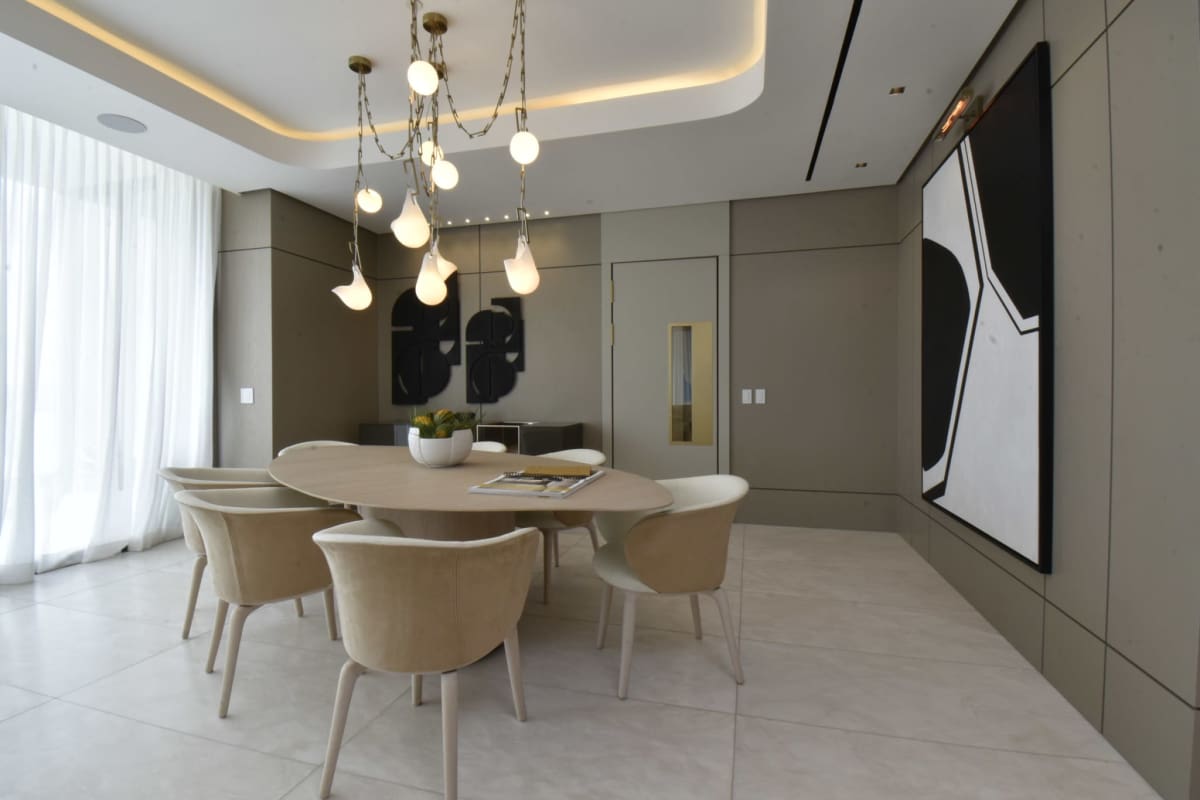 Contemporary Italian kitchen design with quartz countertops and built-in appliances in luxury Santa Maria condo