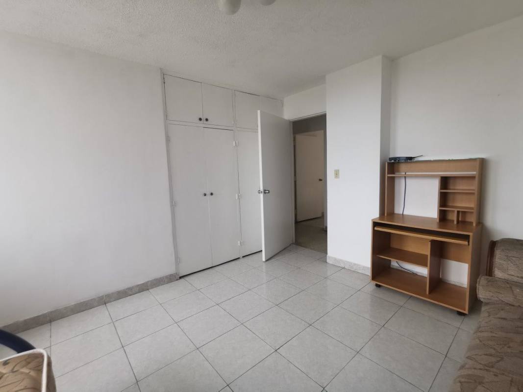 Bedroom featuring tile flooring, large window with city views in PH Fuente de los Cibeles Betania