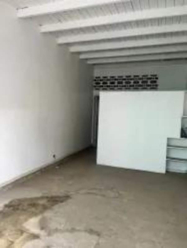 Street-facing balcony overlooking colorful colonial buildings in Santa Ana Panama City