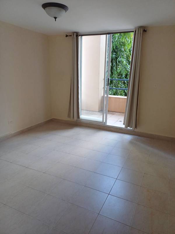 Master bedroom with tile floors, neutral walls, closet in PH Terrazas de San Francisco Panama City