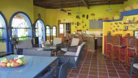 Rustic outdoor kitchen with BBQ grill brick oven Coronado beach house