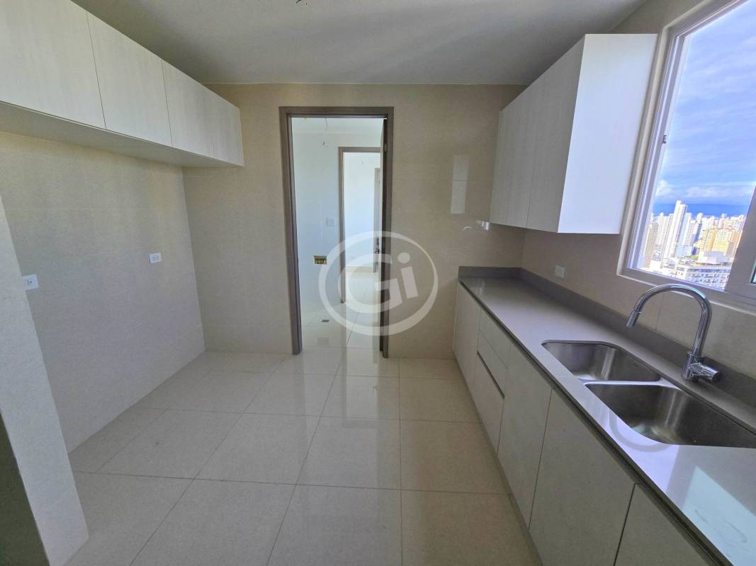 Elegant bathroom featuring double sinks, marble finishes, walk-in shower at Costanera Tower South Panama