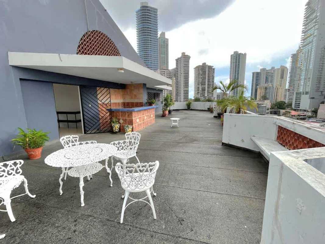 Modern bathroom with granite vanity and glass walk-in shower in Punta Paitilla apartment