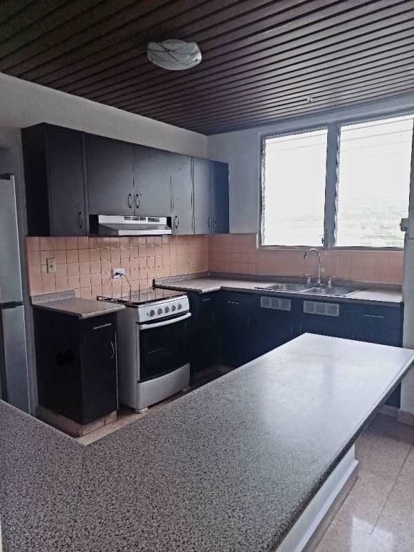 Entryway with console table, large mirror, wood ceiling in Villa Lilla Altos de Golf Panama City