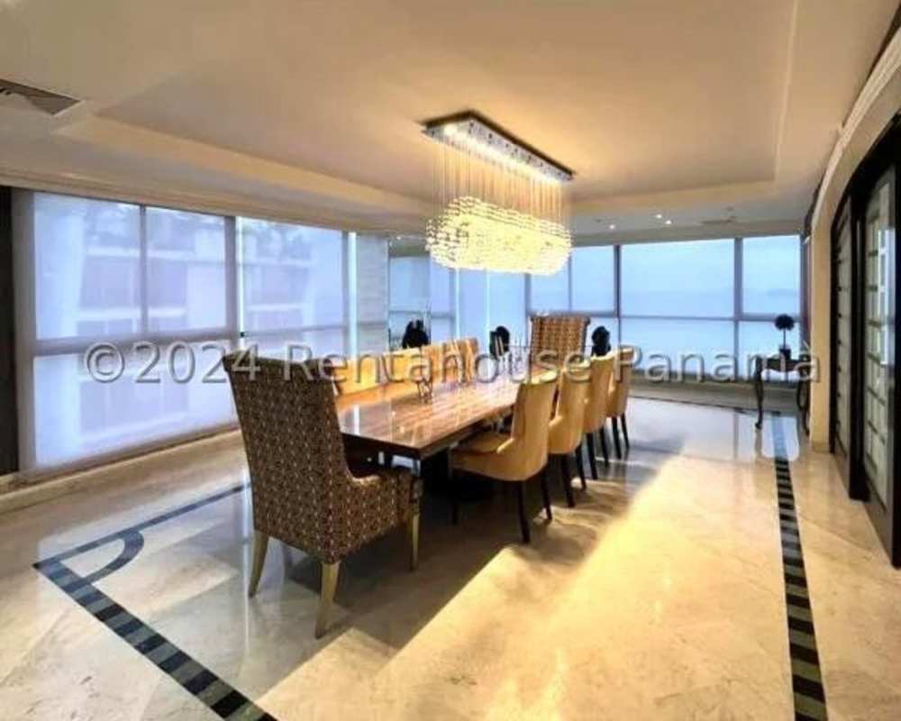 Dining room with floor-to-ceiling windows and panoramic sea views in PH Punta del Sol Punta Paitilla Panama