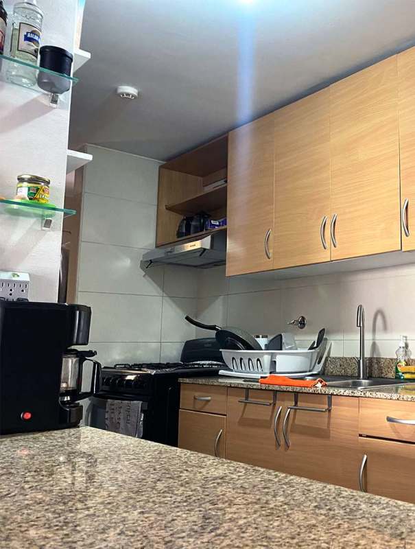 Apartment open plan living dining with large windows, city view, glass table in PH 4 Islas Panama