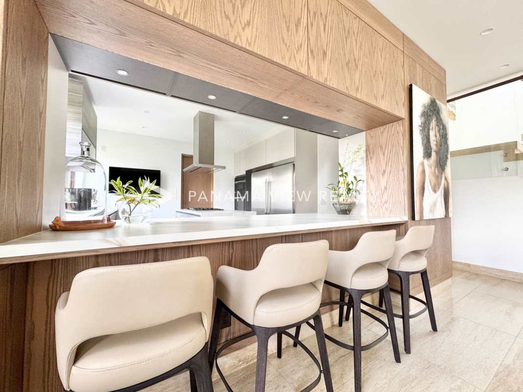 Luxury Italian kitchen with island breakfast bar and marble floors in Panama Santa Maria home for sale