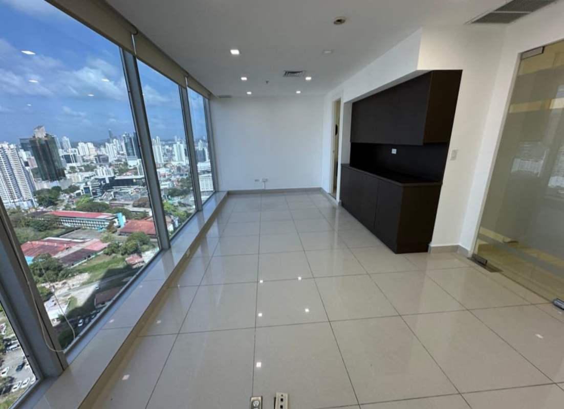 Glass partition hallway inside modern commercial office at Oceanía Tower 1000 Punta Pacífica Panama