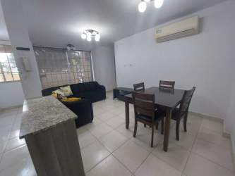 Open plan living and dining room with ceramic tile floor and natural light in La Chorrera