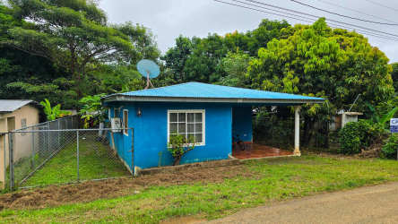 Garden view of Cambutal Panama property fenced yard mature trees low maintenance