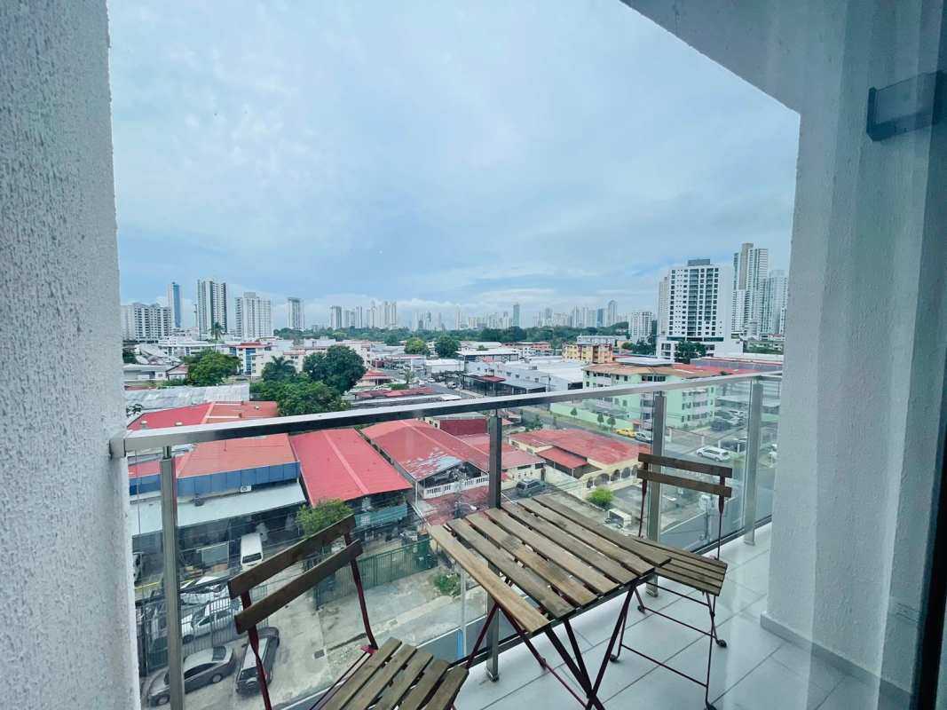 Balcony with glass railing overlooking Panama City at PH Demetra Parque Lefevre