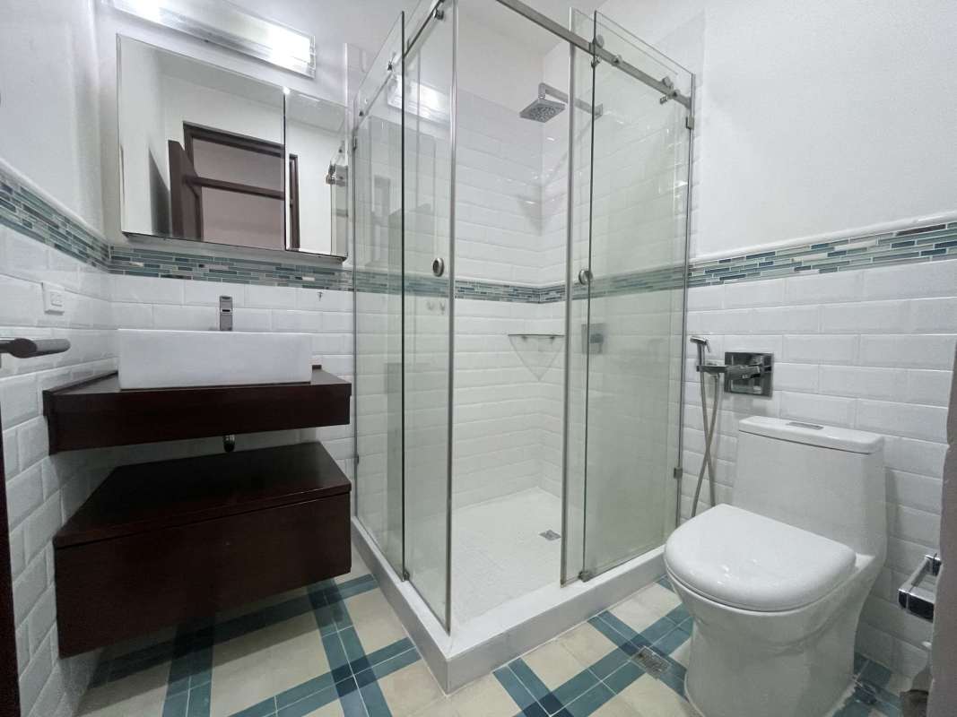 Bathroom with glass shower enclosure, modern vanity in Portal de Caldas Casco Viejo Panama