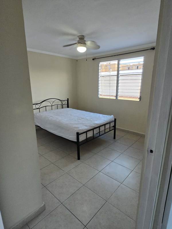 Bathroom with shower curtain, blue sink and toilet PH Samantha Towers Panama