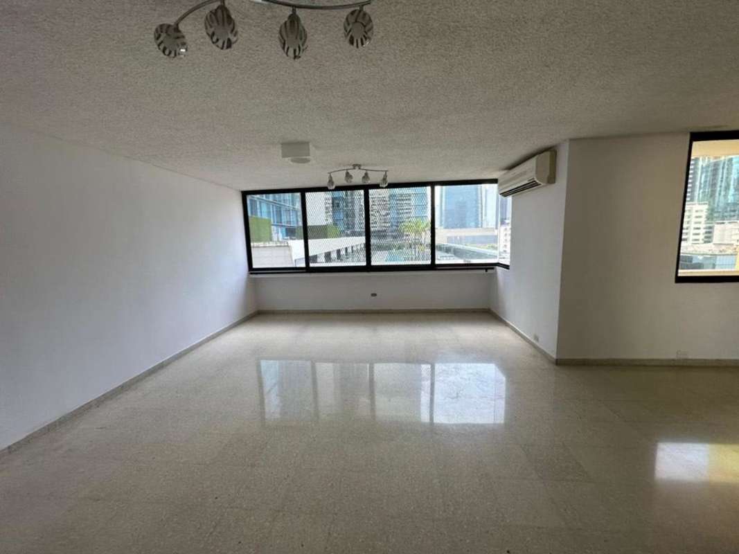 Living room with neutral tiles, large windows, AC at PH Diamond Tower Panama City