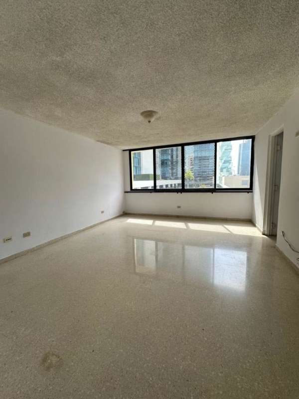 Open-plan living dining room with porcelain floors and large windows, PH Diamond Tower Obarrio Panama