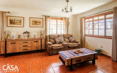 Spacious bright living room with large windows and mountain views in Boquete Panama