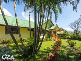 Cozy covered patio overlooking lush gardens at Volcancito Road Boquete Panama