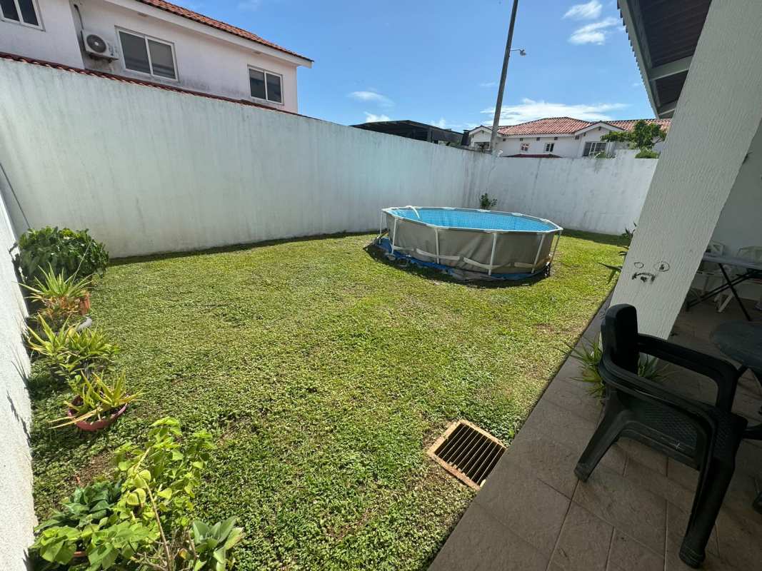 Bedroom featuring geometric feature wall and modern furnishings in Quintas de Versalles Panama