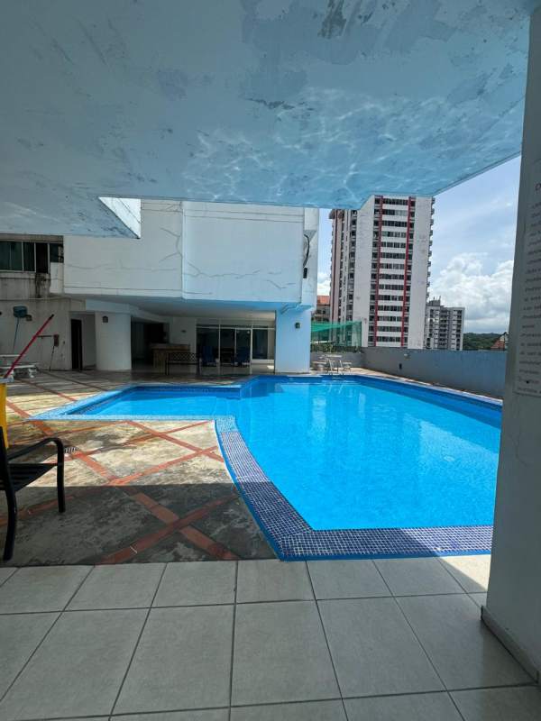 Outdoor swimming pool on terrace with city view at Golden Boulevard Panama City