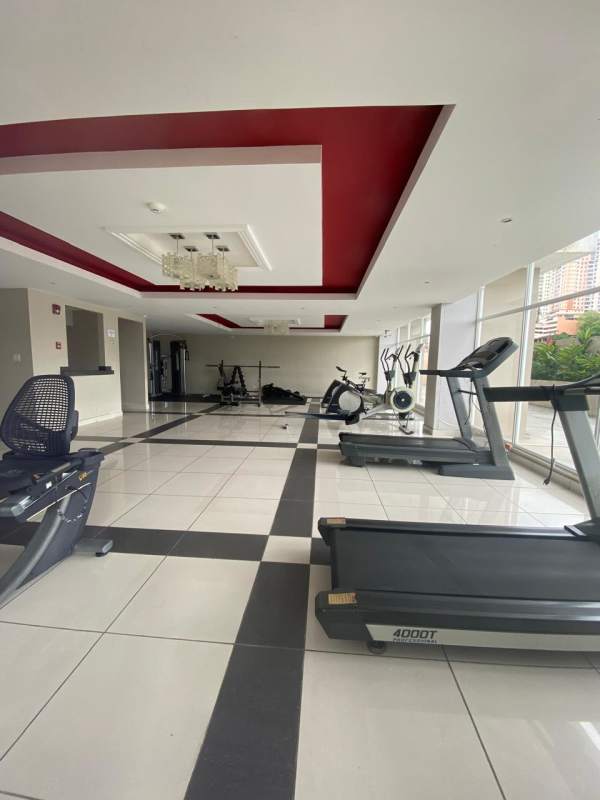 Condominium gym with cardio and strength machines, large windows PH Torre 88 in Panama City