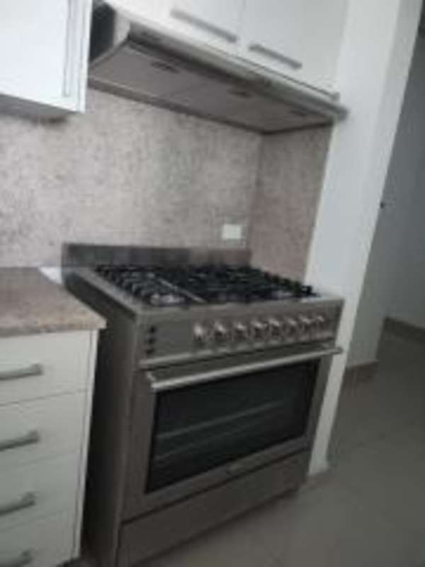 Furnished master bedroom with large windows ocean view in PH Top Tower