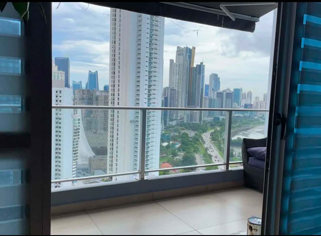 Balcony view overlooking Panama City skyline at PH Vista Balboa for sale