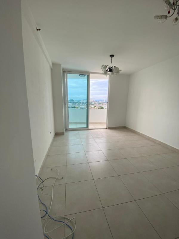 Bright tiled living room sliding glass door to balcony PH Elmare Plaza Edison
