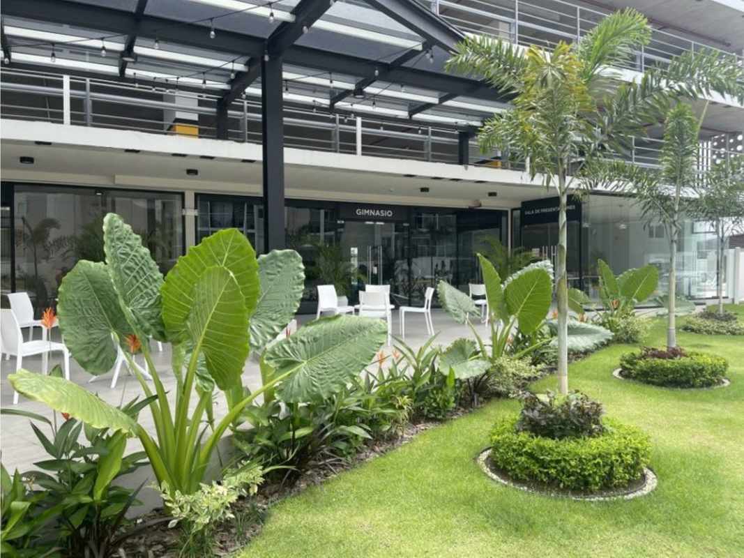 Exterior with garden landscaping social lounges of PH Panama Viejo Tower 7 Panama City