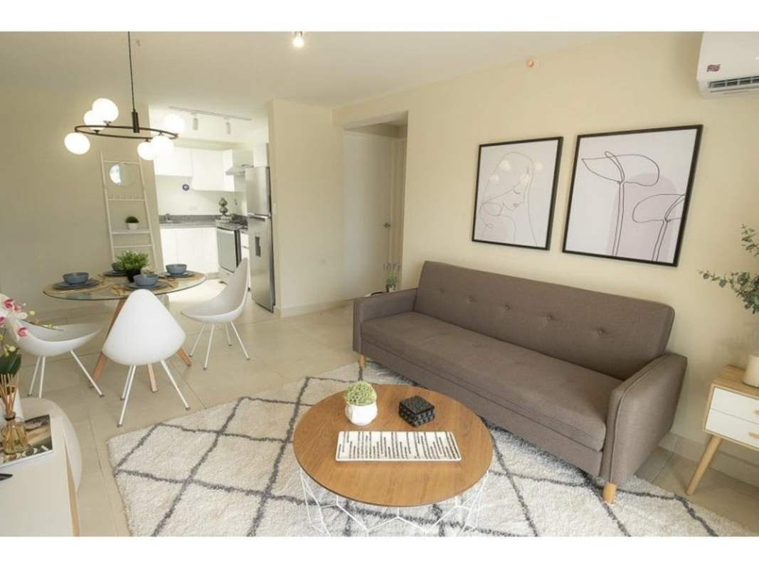 Bright open plan living dining with sliding glass balcony PH Panama Viejo Tower 7 Panama