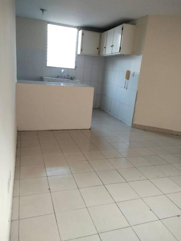 Minimalist kitchen with cabinets and tiled floor San Miguelito Panama