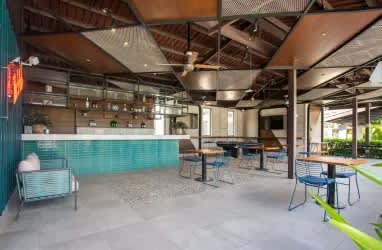 Contemporary lounge bar with turquoise tiles at River Valley Panama Pacifico