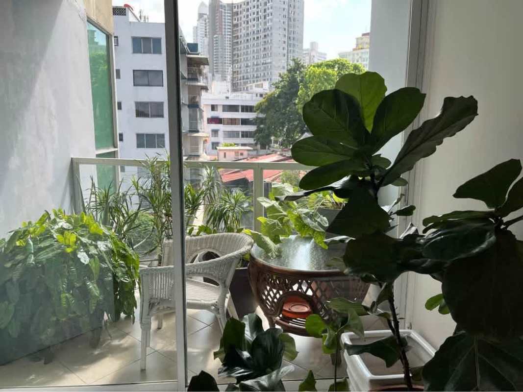 Private balcony with panoramic city skyline views at PH Dalí El Cangrejo Panama City