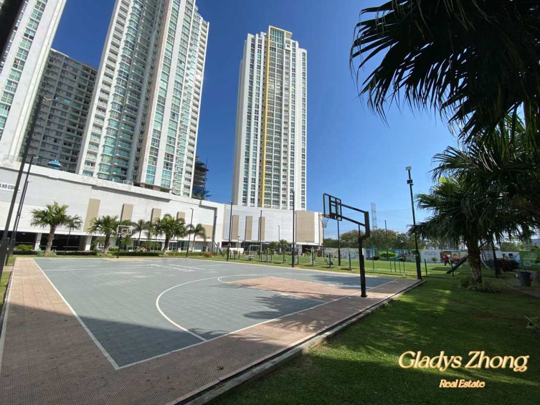 Basketball court surrounded by gardens at PH King's Park modern apartment complex Panama City
