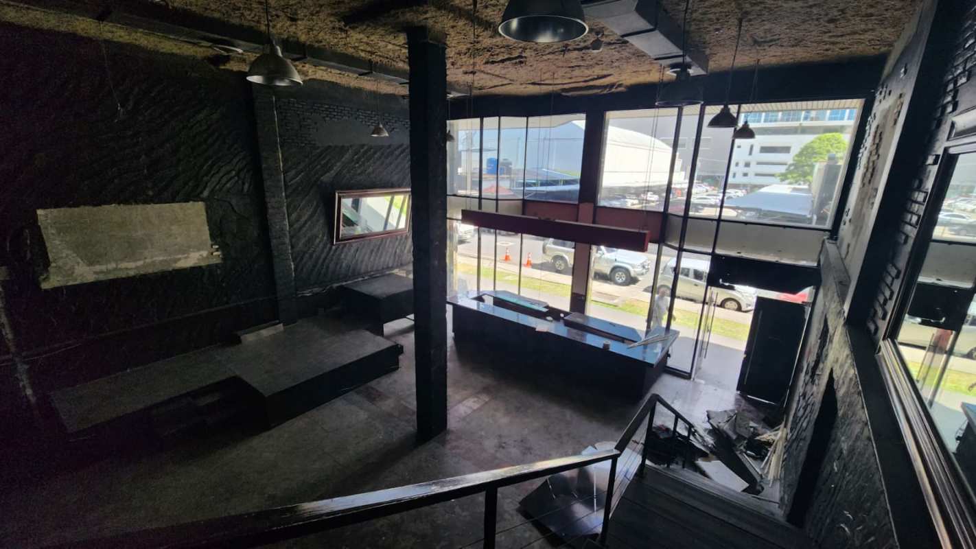 Commercial lobby space with expansive windows, pendant lighting, and industrial finishes in Obarrio Panama