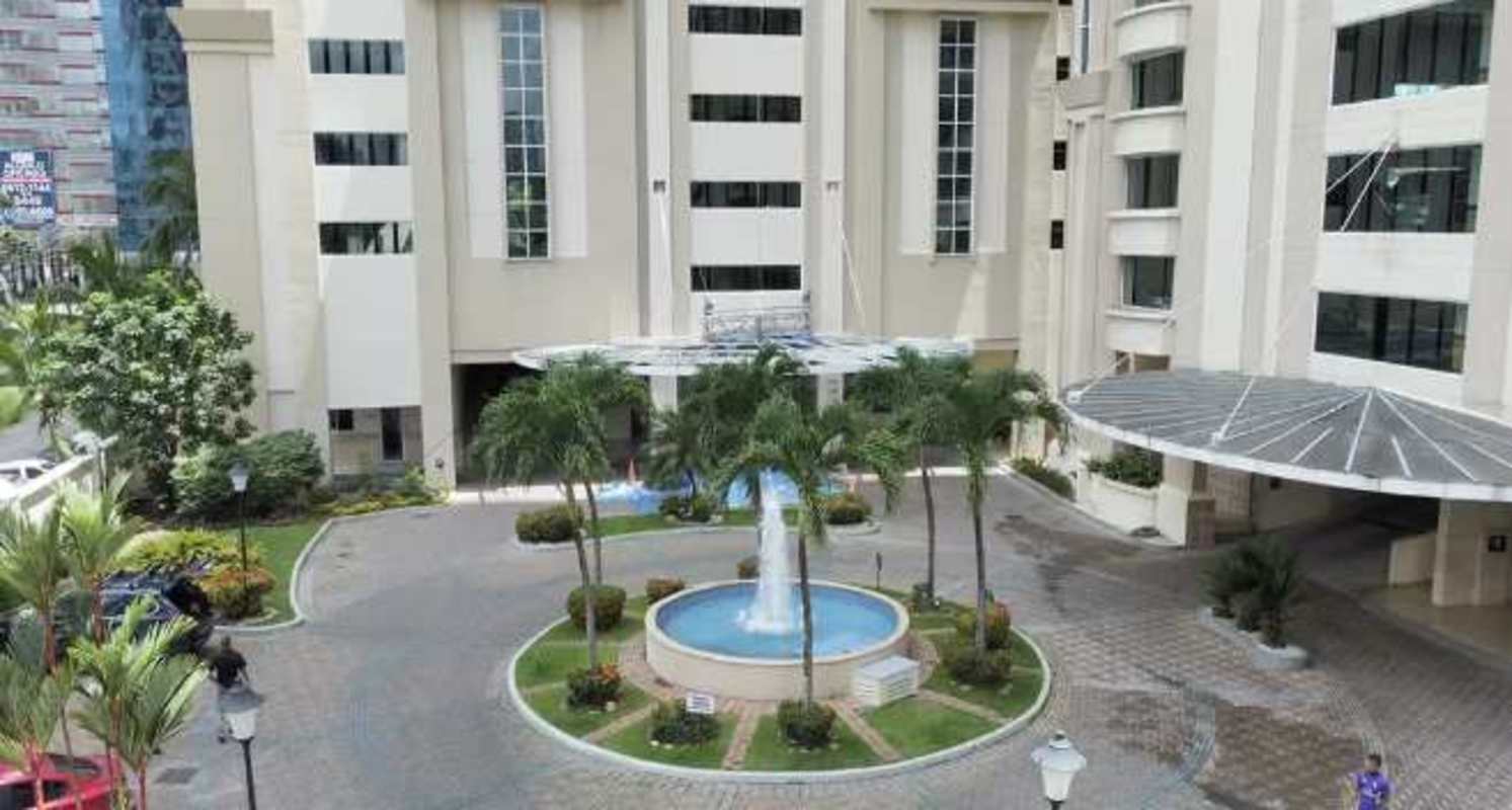 Fountain and landscaped entry PH Costa Pacifica Punta Pacifica Panama