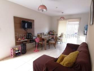 Open style living and dining space with sofa and TV in house for rent La Chorrera Panama Oeste